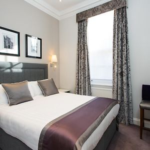 Suite met een Queen Size Bed